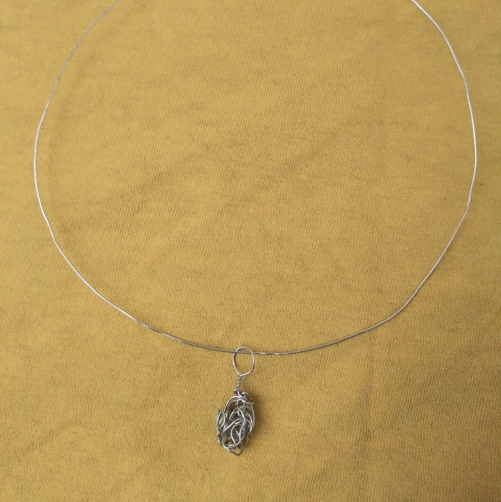 Exotic handcrafted pendant / chain enhancer